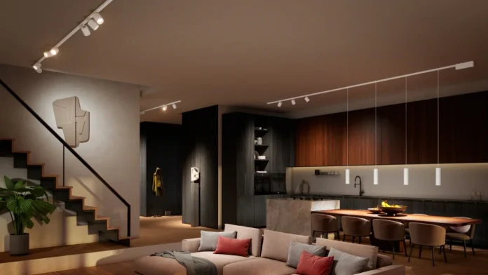 Modernes Wohnzimmer mit Philips Hue-Schienenbeleuchtung und Hängeleuchten für eine warme, stimmungsvolle Atmosphäre.