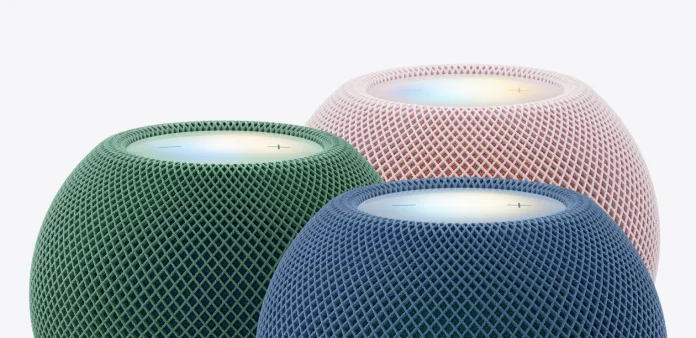 Die HomePod mini 2 in den Farben Grün, Rosa und Blau, mit der beleuchteten Touch-Fläche oben